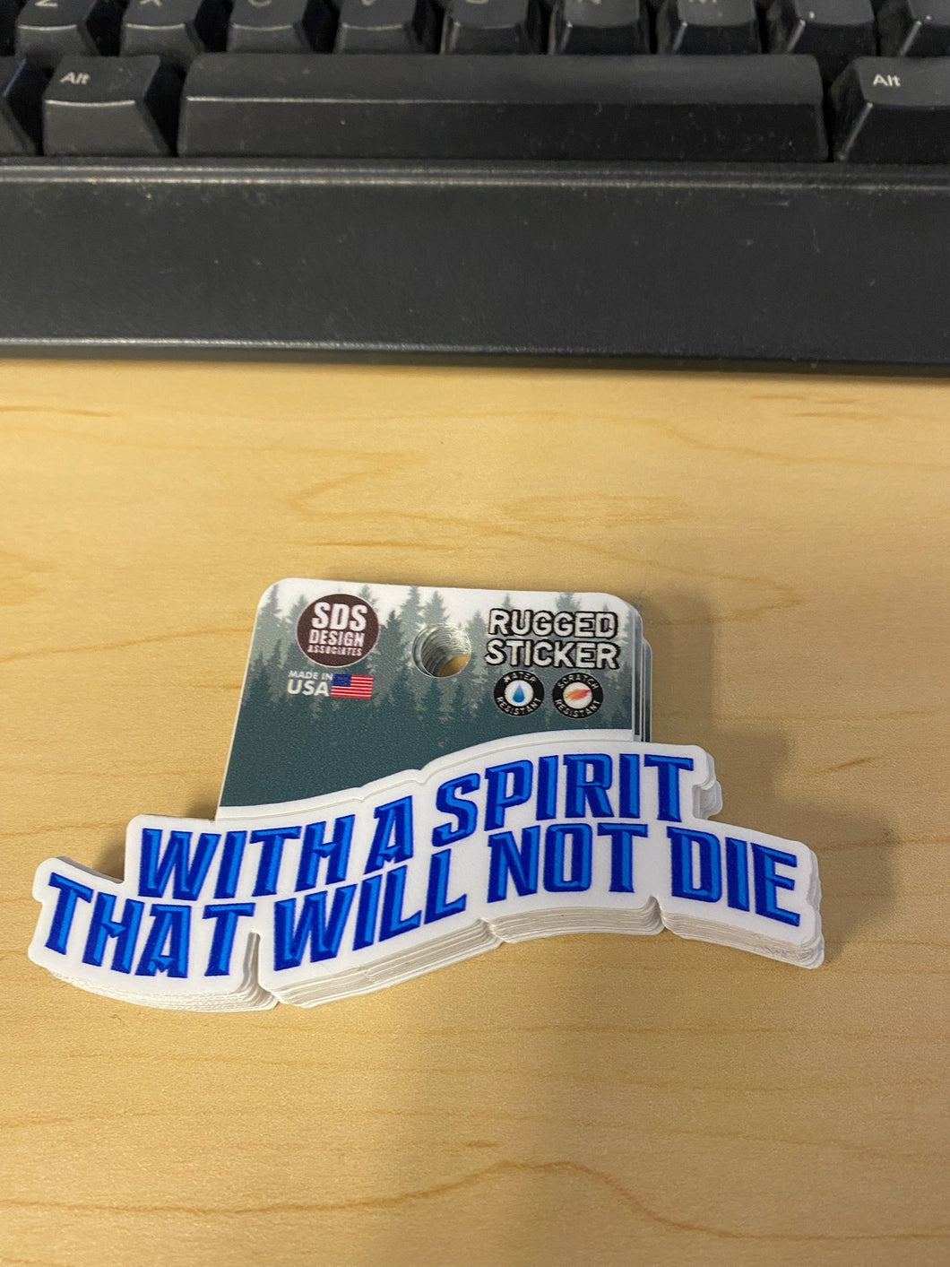 With a Spirit That Will Not Die Rugged Sticker